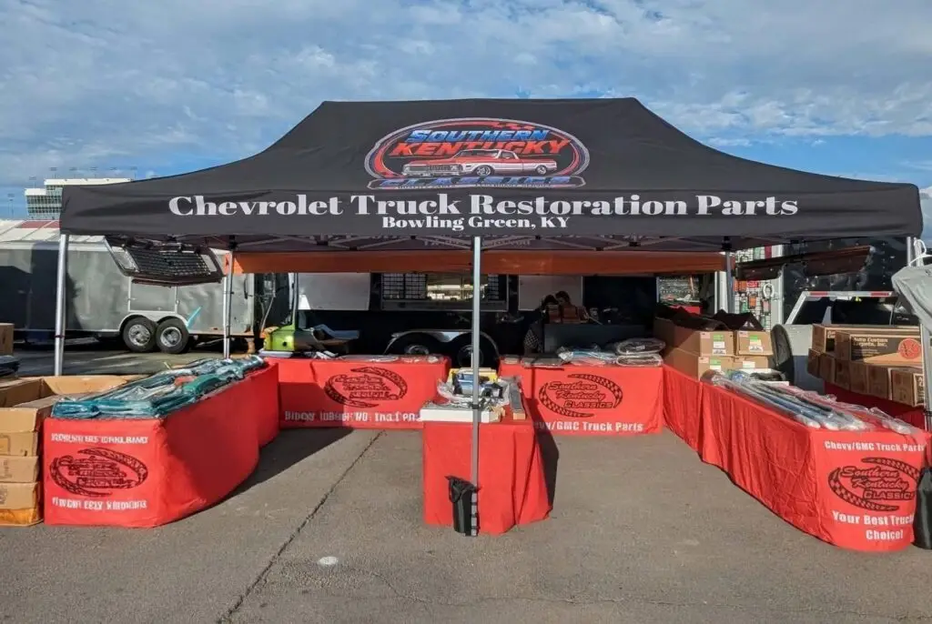 Southern Kentucky Classics booth at a truck show with tables of Chevy and GMC truck parts